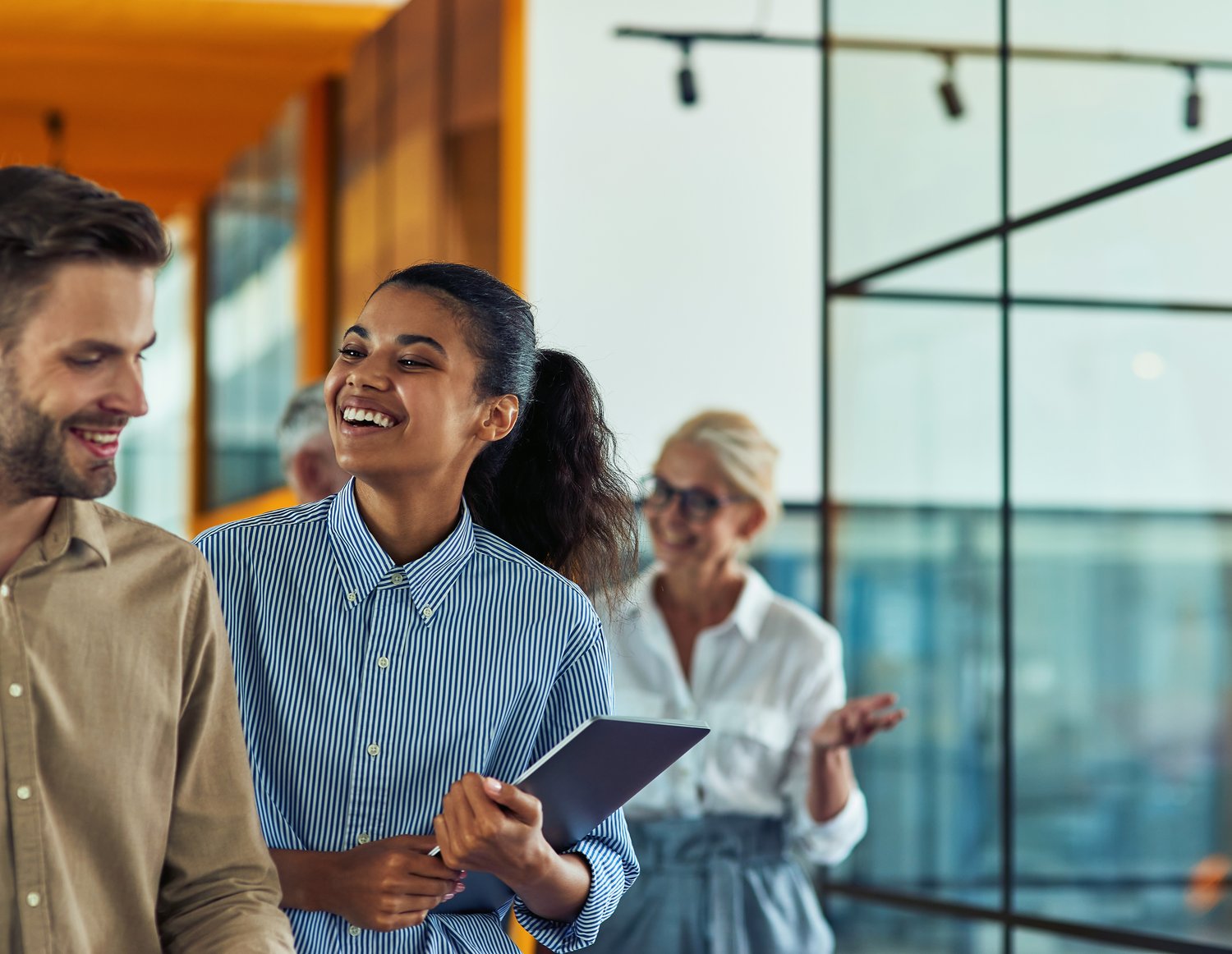 Colleagues in conversation at the Kentucky Asset Protection office