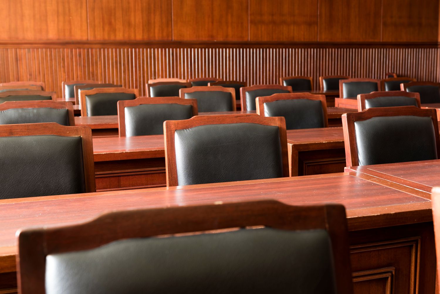 Empty jury box in a courtroom